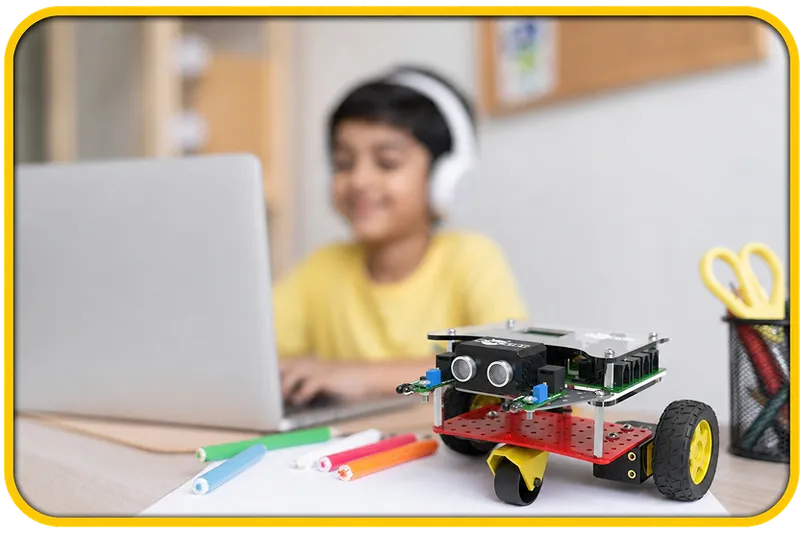 Kits — building a robot beside a laptop