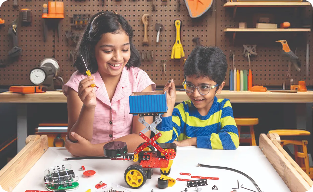 About hero — students building a robot kit